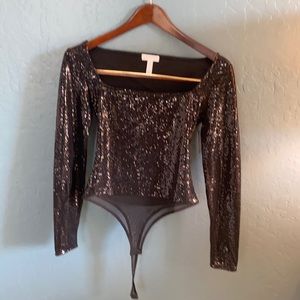 Black small sequined bodysuit.